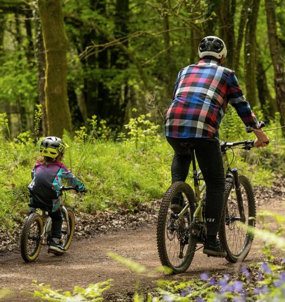 Cyclists riding forest trails at Sherwood Pines